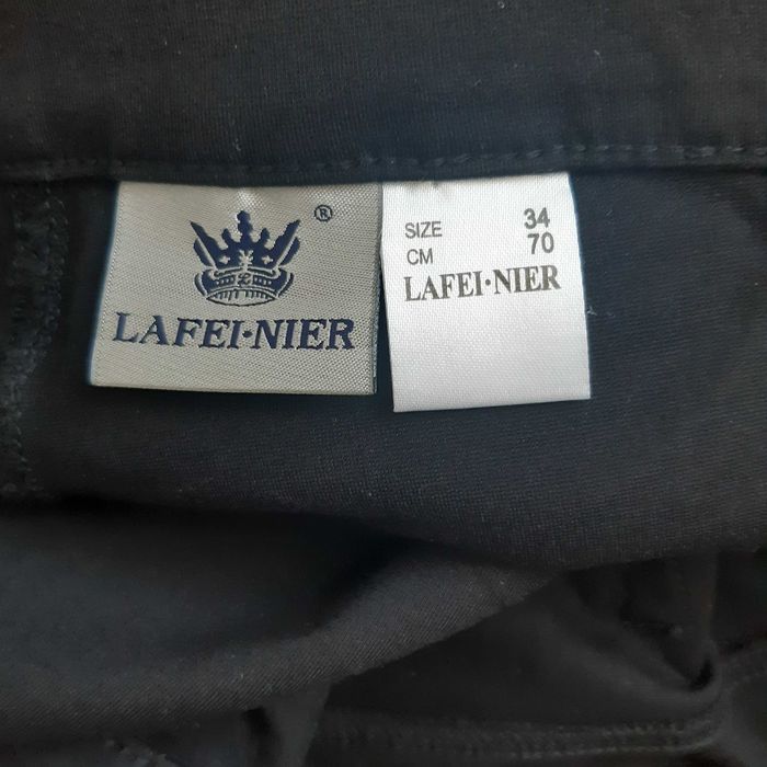 Spodnie elegackie czarne z Rayonu.