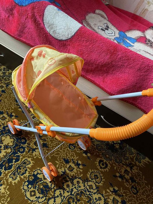 Дитяча коляска для ляльок