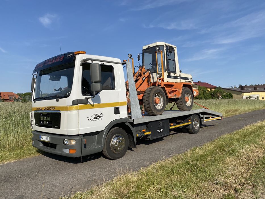 Usługi transportowe maszyn rolniczych i budowlanych laweta transport