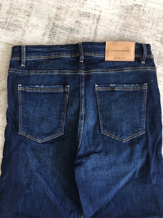 Nowe spodnie jeansowe z naszywkami Mohito xs 34