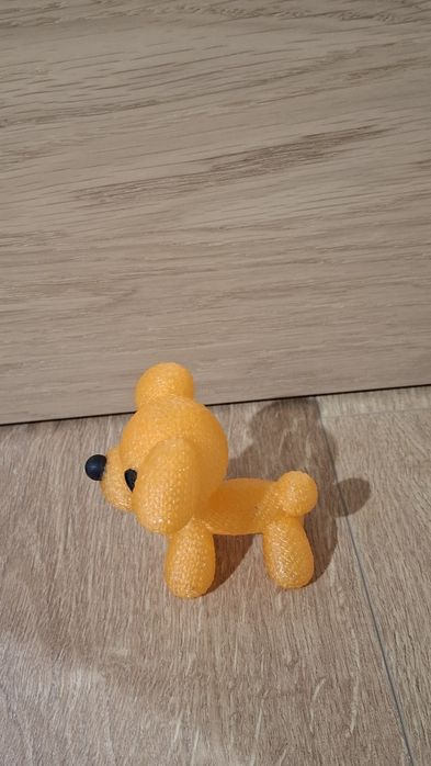 Figurka pomarańczowego pieska. Wydruk 3D