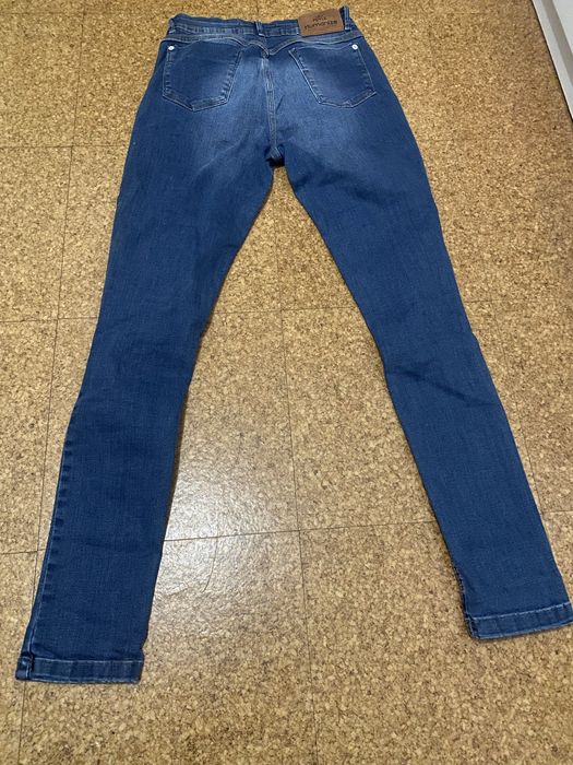 Calças skiny de ganga