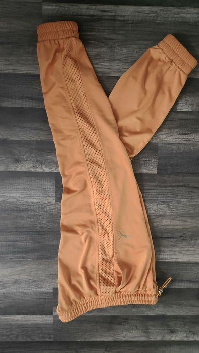 świetne deesowe spodnie PUMA