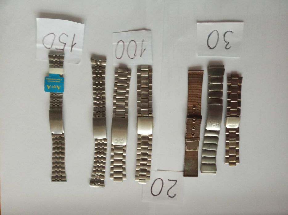 Металеві браслети до годинників