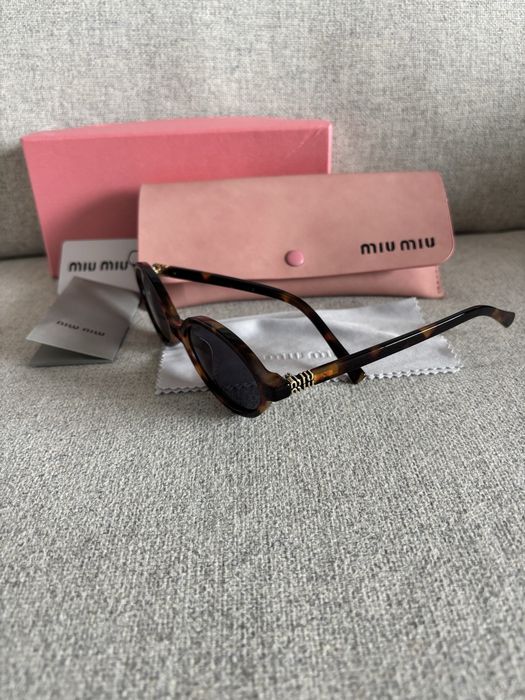 Sunglasses Miu Miu