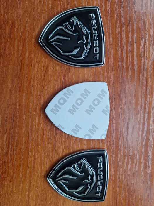 Нова эмблема ПЕЖО