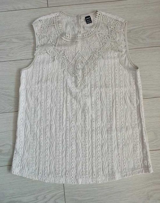 Nowa elegancka bluzka na lato z ozdobnym dekoltem rozm 38 M