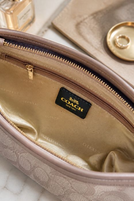 Bolsa Coach pele genuina