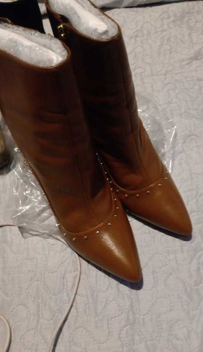 Super Promoção,70 porcento de desconto,lindas botas compre agora.