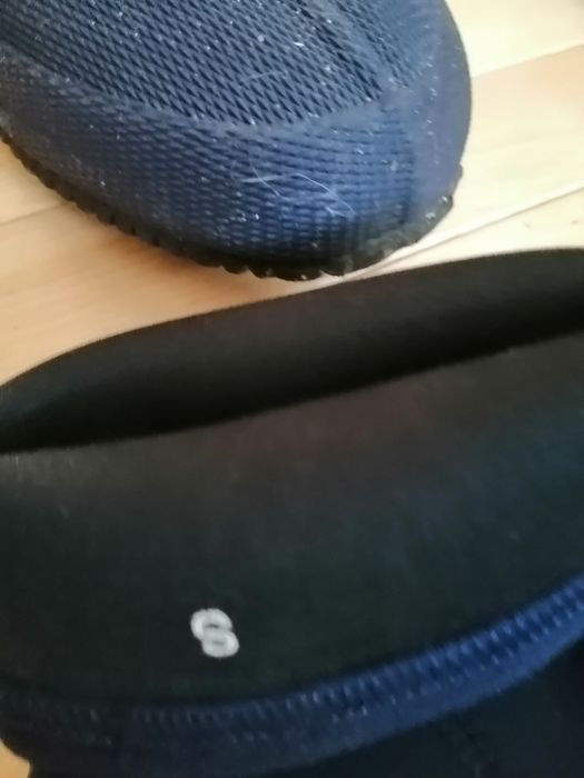 Botas e acessórios de mergulho.