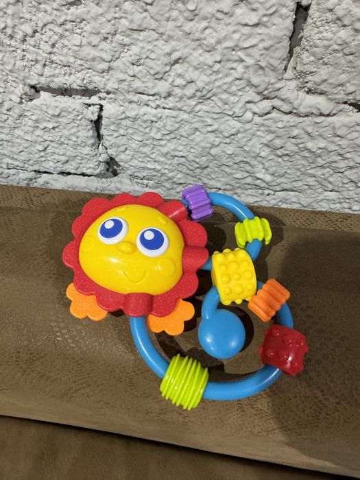 Брязкальце-прорізувач Playgro Лев