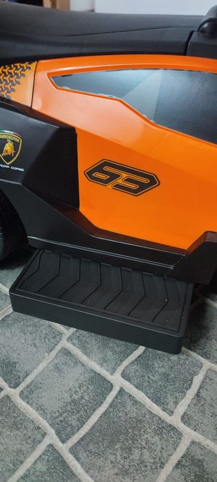Carro bebé Lamborghini laranja impecável