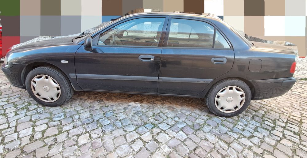 Viatura Mitsubishi Carisma 2003