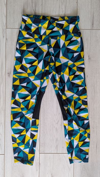 Wielokolorowe leginsy z kieszonką na zamek Crivit S 36