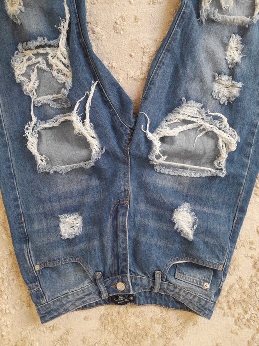 Spodnie mom jeans dziury przetarcia bawełna jeansy m l modne