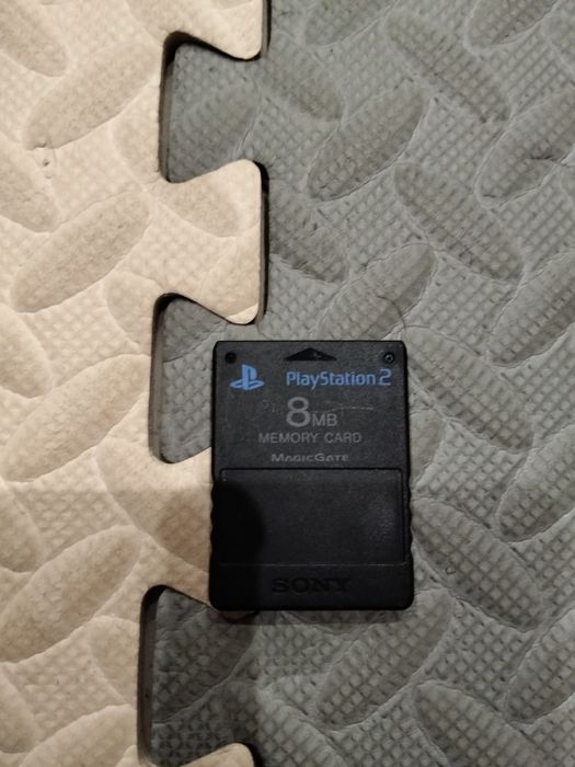 Uma Ps2 com comando e muito mais