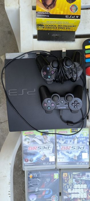 PS3 + 2 controllers + games + 2 microphones64284424265345123