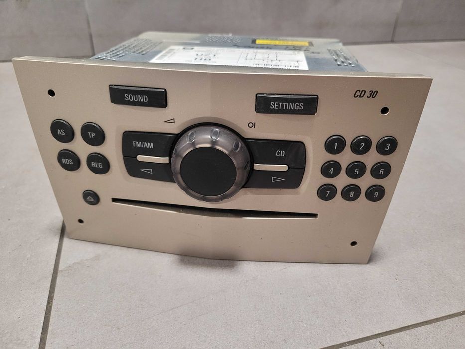 Radio samochodowe fabryczne Opel Corsa D 497.316.088 złote srebrne