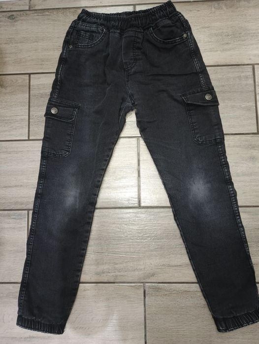 Утеплені джинси на хлопчика 10-11 років.