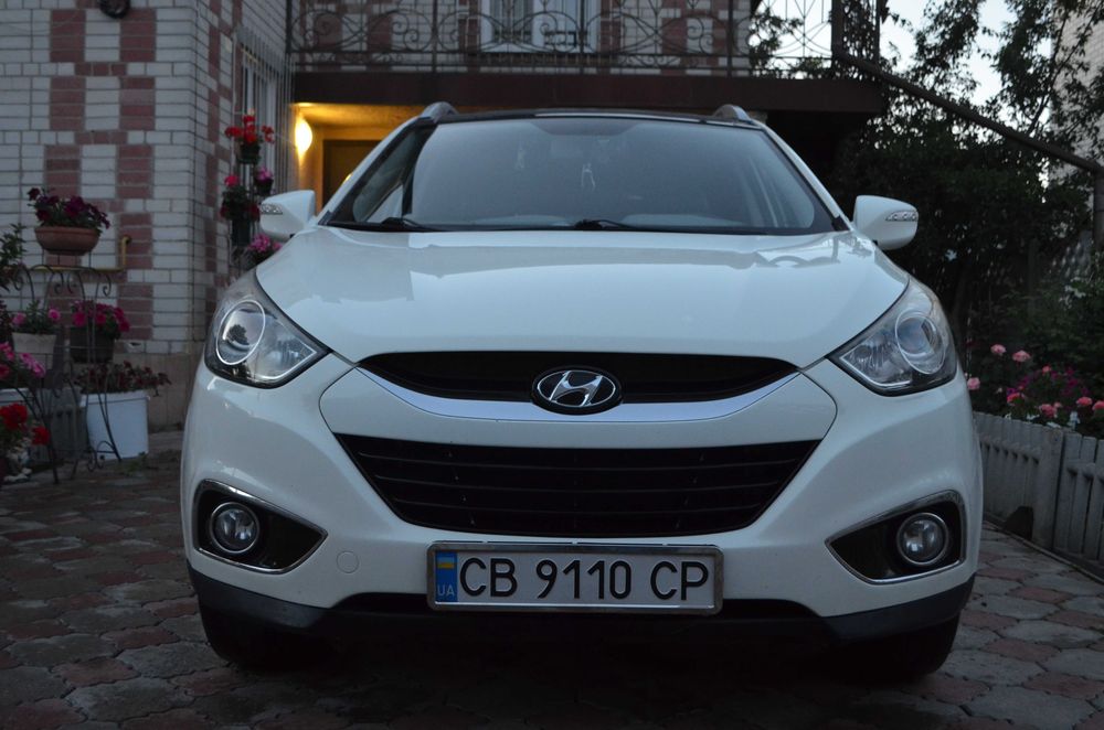 Hyundai ix35 2010 VIN KMHJU81CDBU167650 фото оголошення 2 з 24