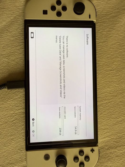 Nintendo Switch Oled, 2 gry, karta 256 GB, pokrowiec