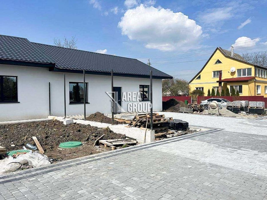 Квартира в клубному будинку з власною ділянкою