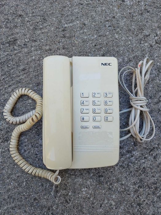 Telefone branco antigo