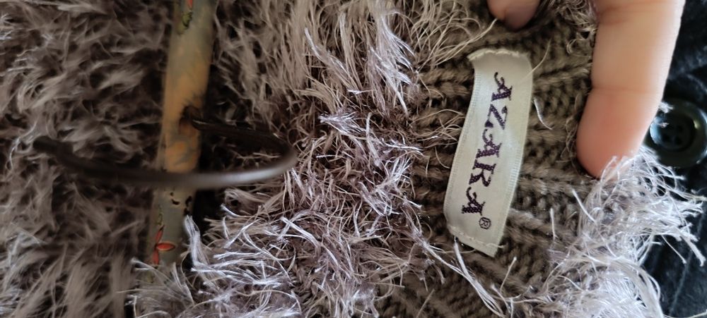 Colete de pelo sem botões . Usado