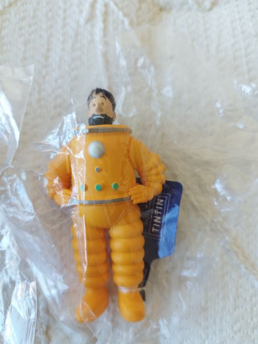 Figuras colecionáveis de Tintim representando o Capitão Haddock e Milu
