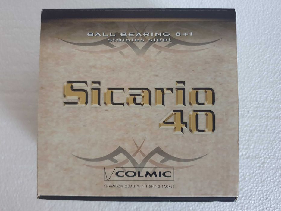 Carreto de pesca Colmic Sicario 40 com duas bobines e caixa original