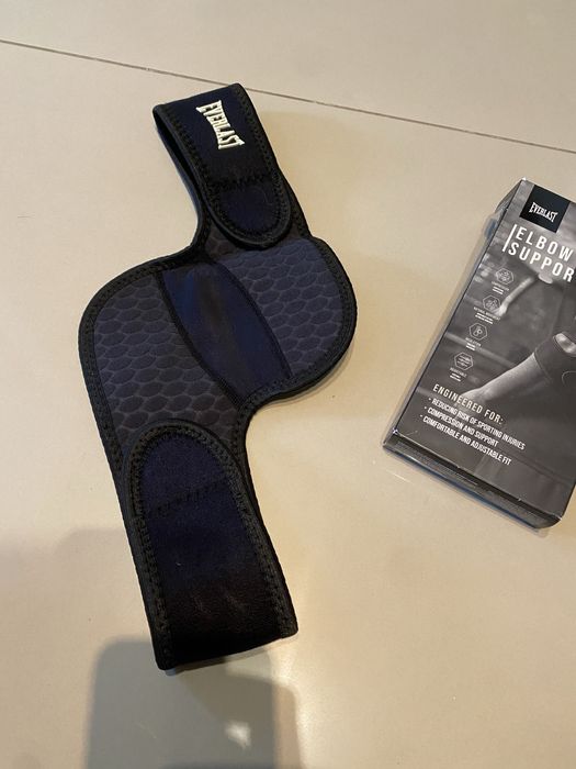 Защита фиксатор поддержка бандаж для локтя everlast