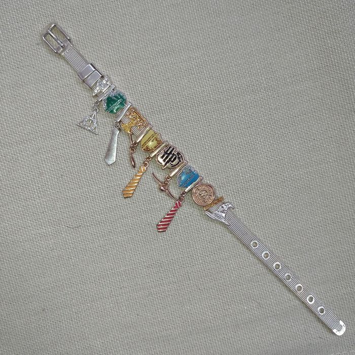 Браслет с подвесками Гарри Поттер WBEI