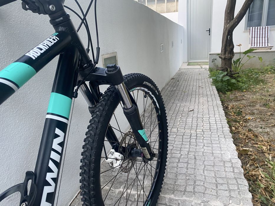 Bicicleta rockrider preta e azul turquesa roda 24