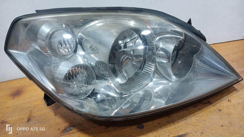 Farol Nissan primera p12 ótica xenon