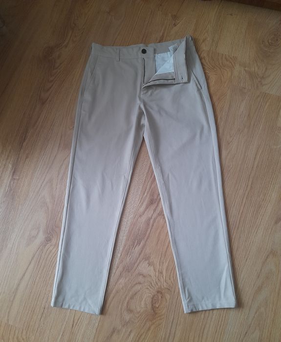 Beżowe męskie  spodnie Zara 38