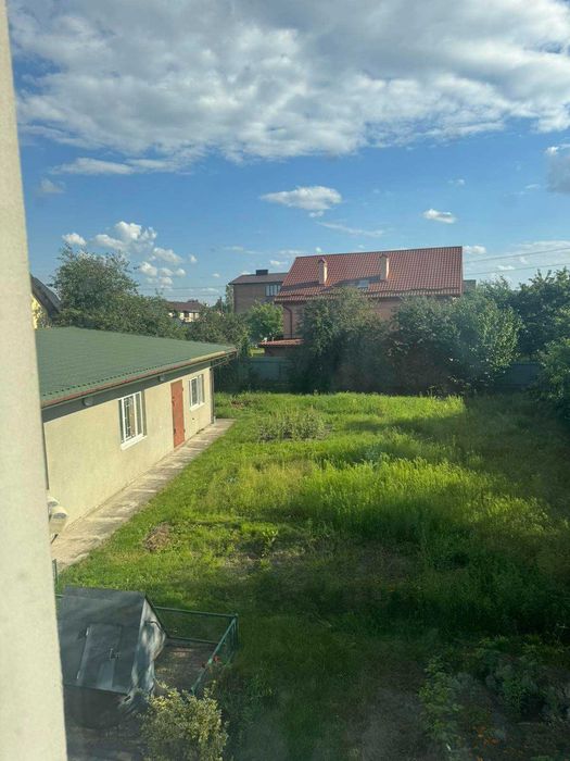 Житловий будинок та земельна ділянка 10 сот., м. Жовква