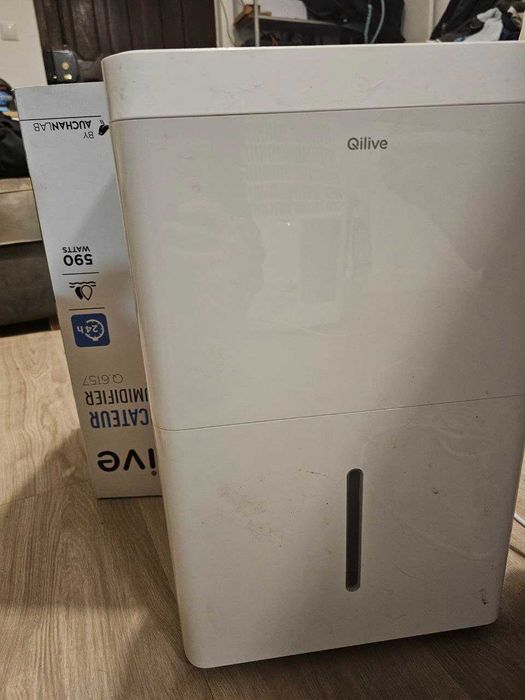 Dehumudifier Qilive com um cheque