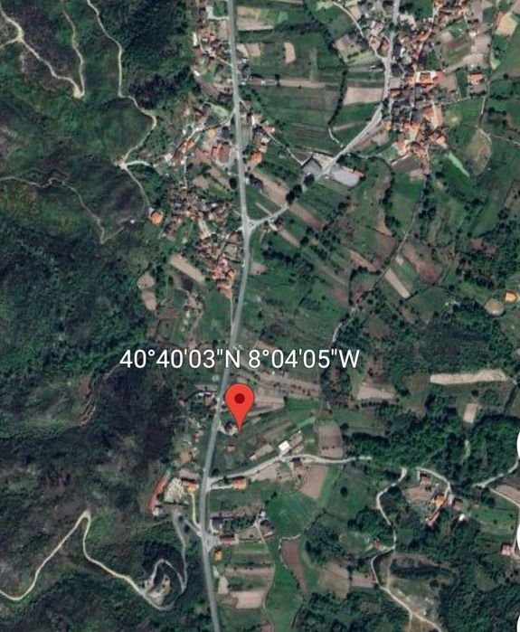 Terreno com construções