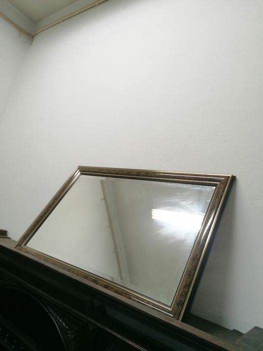 Espelho com moldura