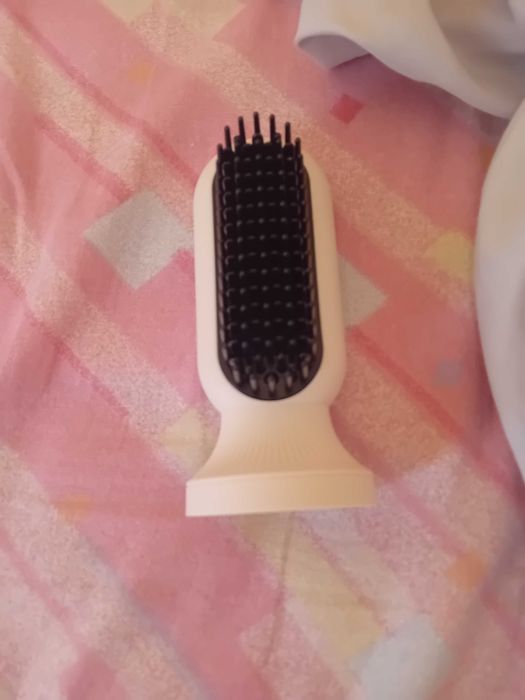 Modelador de cabelo automático