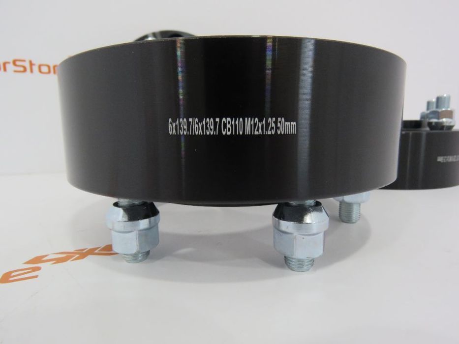 Espaçadores 4x4 50mm Nissan  6x139.7 M12x1.25 Pretos CB 110