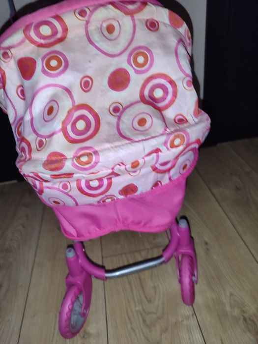 Коляска з іграшками