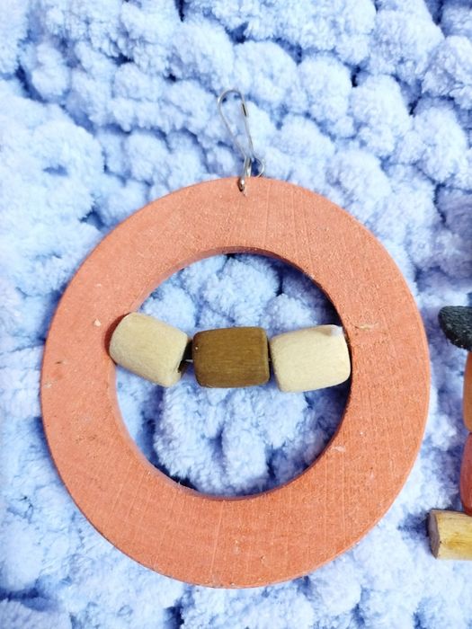 Дерев'яні іграшки-гойдалки, драбини для папужки