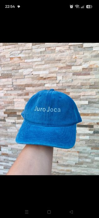 Boné com a frase Juro Joca