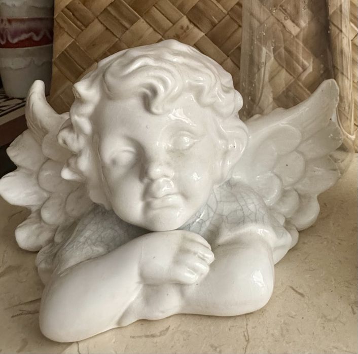 Par de anjos da guarda em porcelana