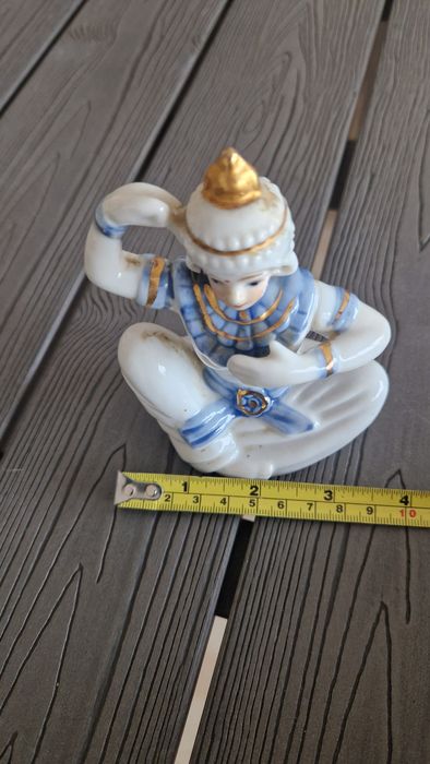 Estatueta de porcelana estilo oriental