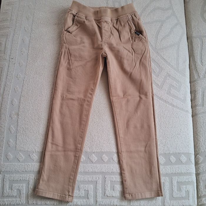 Джинси бежеві 122-128см