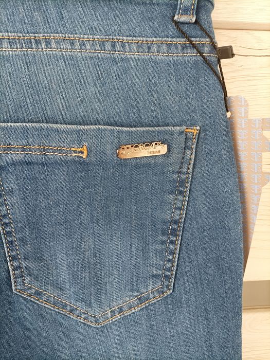 Nowe spodnie jeansowe z wysokim stanem dopasowane S/36 niebieskie