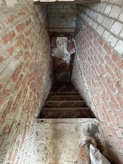 Цегляний будинок в Нових Санжарах