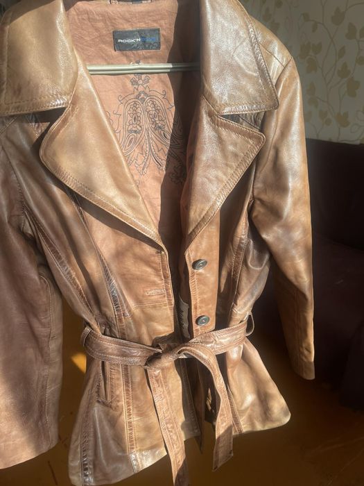Шкіряна куртка .